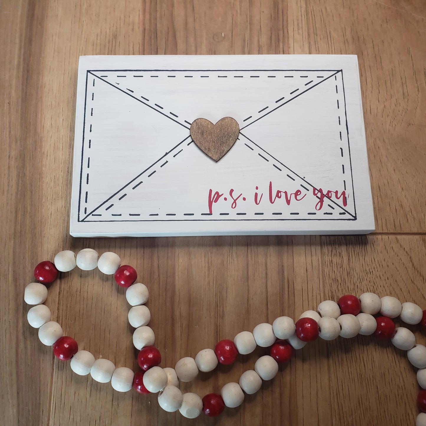 Envelope with p.s. i love you with 3D heart