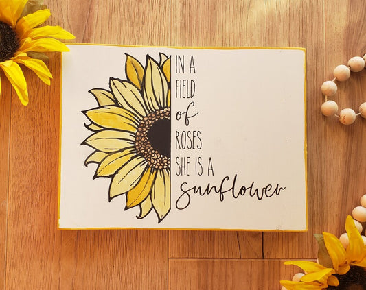 In a field of roses she is a Sunflower